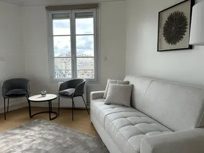 Coin salon dans l'établissement Elegant Eiffel tower view flat