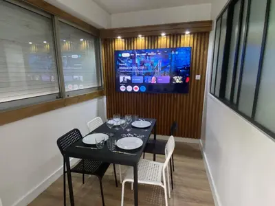 Télévision ou salle de divertissement dans l'établissement Appartement bassin de la villette
