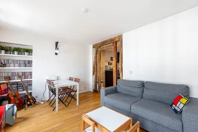 Coin salon dans l'établissement GuestReady - Confort et Élégance au Cœur de Paris