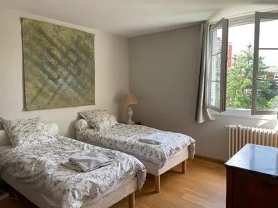 Un ou plusieurs lits dans un hébergement de l'établissement APPARTEMENT BOULOGNE BILLANCOURT TOUT PRES de ROLAND GARROS