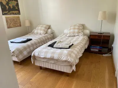 Un ou plusieurs lits dans un hébergement de l'établissement APPARTEMENT BOULOGNE BILLANCOURT TOUT PRES de ROLAND GARROS