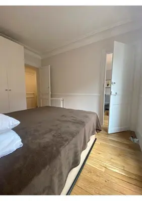Un ou plusieurs lits dans un hébergement de l'établissement Sunny Bastille-Roquette Paris