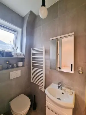 Salle de bains dans l'établissement Appartement de charme dans les Batignolles