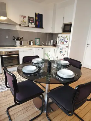 Cuisine ou kitchenette dans l'établissement Appartement de charme dans les Batignolles