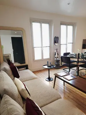 Coin salon dans l'établissement Appartement de charme dans les Batignolles