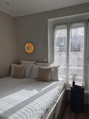 Un ou plusieurs lits dans un hébergement de l'établissement Appartement de charme dans les Batignolles