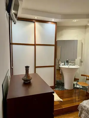 Télévision ou salle de divertissement dans l'établissement Appartement de 2 chambres au cœur de Paris