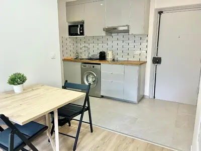 Cuisine ou kitchenette dans l'établissement Charmant Appartement au Cœur du 13ème Arrondissement de Paris