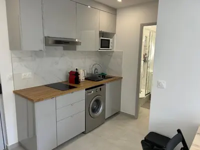 Cuisine ou kitchenette dans l'établissement Charmant Appartement au Cœur du 13ème Arrondissement de Paris