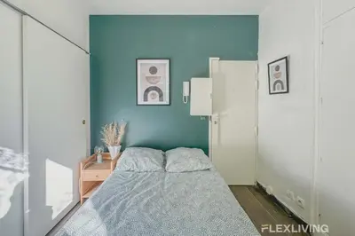 Un ou plusieurs lits dans un hébergement de l'établissement Flexliving - Studio - Longchamps