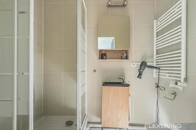 Salle de bains dans l'établissement Flexliving - Studio - Longchamps