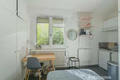Cuisine ou kitchenette dans l'établissement Flexliving - Studio - Longchamps