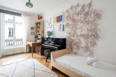 Un ou plusieurs lits dans un hébergement de l'établissement Appartement Ottomane - Welkeys