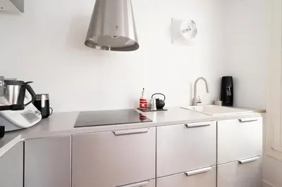 Cuisine ou kitchenette dans l'établissement Appartement Ottomane - Welkeys