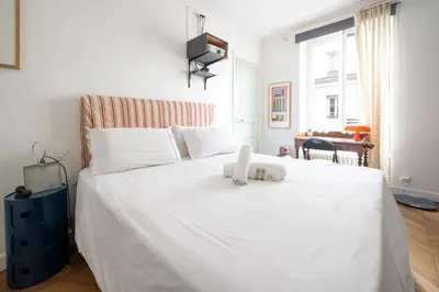 Un ou plusieurs lits dans un hébergement de l'établissement Appartement Ottomane - Welkeys