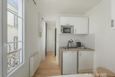 Cuisine ou kitchenette dans l'établissement Flexliving - Studio - Étienne Marcel