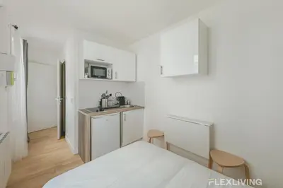 Cuisine ou kitchenette dans l'établissement Flexliving - Studio - Étienne Marcel