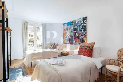 Un ou plusieurs lits dans un hébergement de l'établissement Dauphine Saint Germain 6th arr 2bedrooms