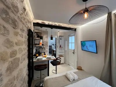 Un ou plusieurs lits dans un hébergement de l'établissement Studios Clouet-Paris Centre- XVe!