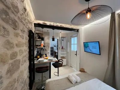 Un ou plusieurs lits dans un hébergement de l'établissement Studios Clouet-Paris Centre- XVe!