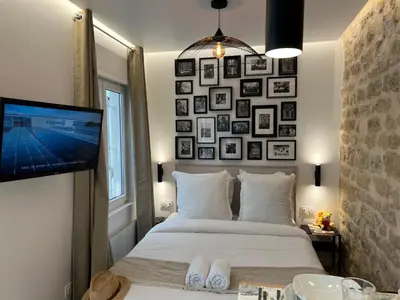 Un ou plusieurs lits dans un hébergement de l'établissement Studios Clouet-Paris Centre- XVe!