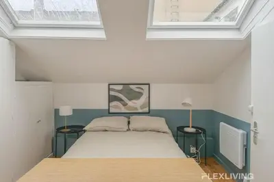 Un ou plusieurs lits dans un hébergement de l'établissement Paris 7e - Elegant Studio near Eiffel Tower & Seine