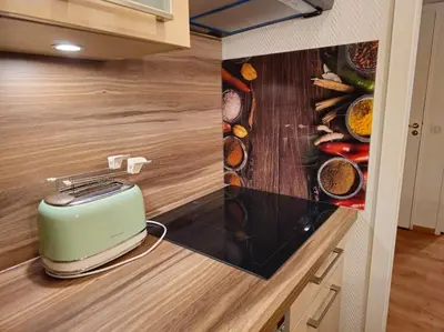 Cuisine ou kitchenette dans l'établissement Paris La Defense - Modern Apartment with Jacuzzi