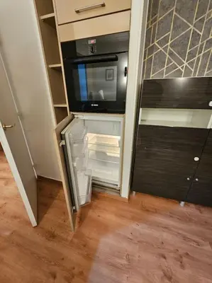 Cuisine ou kitchenette dans l'établissement Paris La Defense - Modern Apartment with Jacuzzi
