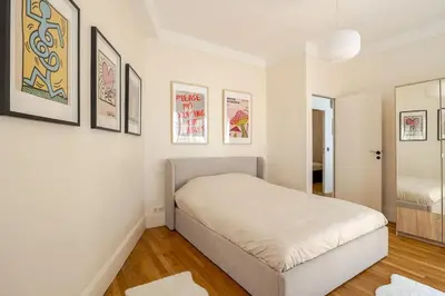 Un ou plusieurs lits dans un hébergement de l'établissement Appartement 3 pièces calme - Bourse, Paris centre