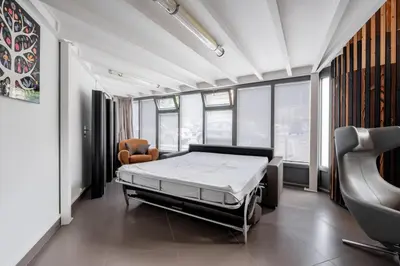Un ou plusieurs lits dans un hébergement de l'établissement Modern loft - close to Eiffel Tower