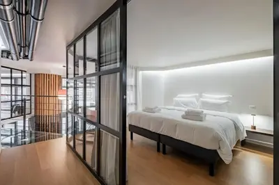 Un ou plusieurs lits dans un hébergement de l'établissement Modern loft - close to Eiffel Tower
