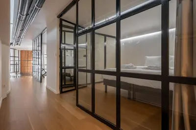 Un ou plusieurs lits dans un hébergement de l'établissement Modern loft - close to Eiffel Tower