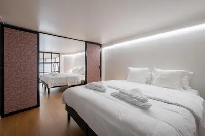 Un ou plusieurs lits dans un hébergement de l'établissement Modern loft - close to Eiffel Tower