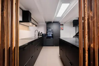 Cuisine ou kitchenette dans l'établissement Modern loft - close to Eiffel Tower