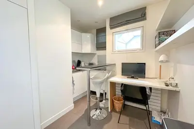 Cuisine ou kitchenette dans l'établissement Flexliving - Studio - Victor hugo
