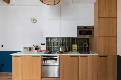 Cuisine ou kitchenette dans l'établissement 3 Pieces Place CONTRESCAPE