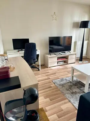 Télévision ou salle de divertissement dans l'établissement Appartement central Paris et confortable