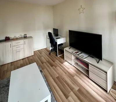 Télévision ou salle de divertissement dans l'établissement Appartement central Paris et confortable