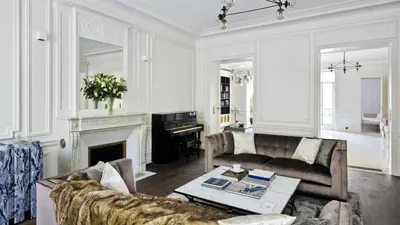 Coin salon dans l'établissement Appartement - Trocadéro