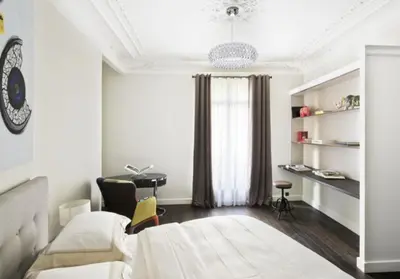 Un ou plusieurs lits dans un hébergement de l'établissement Appartement - Trocadéro