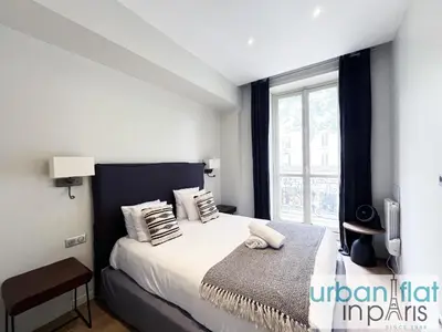 Un ou plusieurs lits dans un hébergement de l'établissement Urban Flat 60 - Sublime Parisian Flat in Paris