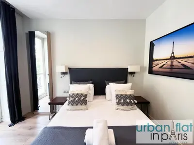 Un ou plusieurs lits dans un hébergement de l'établissement Urban Flat 60 - Sublime Parisian Flat in Paris