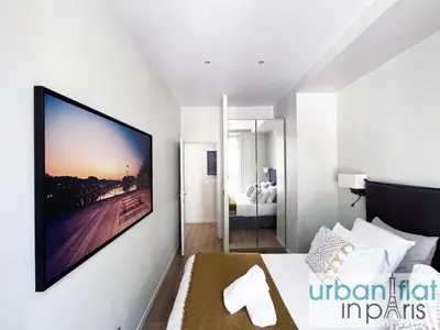 Un ou plusieurs lits dans un hébergement de l'établissement Urban Flat 60 - Sublime Parisian Flat in Paris