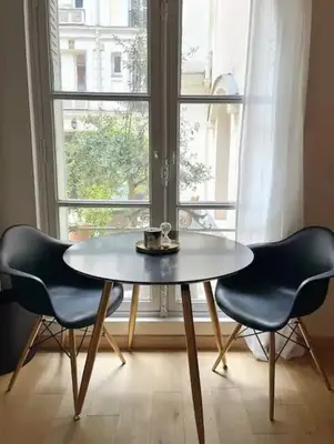 Coin salon dans l'établissement Contemporary apartment 150 meters from Place Victor Hugo Paris 16