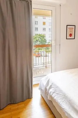 Un ou plusieurs lits dans un hébergement de l'établissement Lumineux appartement Vanves Porte de Versailles
