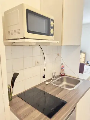 Cuisine ou kitchenette dans l'établissement Devenez voisin du Président
