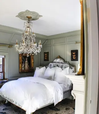 Un ou plusieurs lits dans un hébergement de l'établissement Louvre Apartment