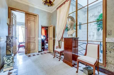 Coin salon dans l'établissement Louvre Apartment