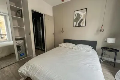 Un ou plusieurs lits dans un hébergement de l'établissement Flexliving - Beautiful 2-room apartment - Chaussée d'Antin - Paris 09
