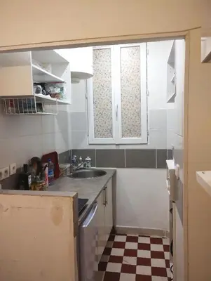 Cuisine ou kitchenette dans l'établissement Charmant studio en centre ville